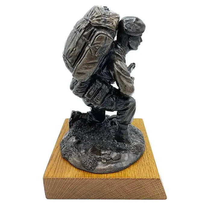Right profile of Kneeling Combat Figure with Beret Bronze Statue on oak base, showcasing realistic military gear and combat readiness.  from  John Bull Clothing