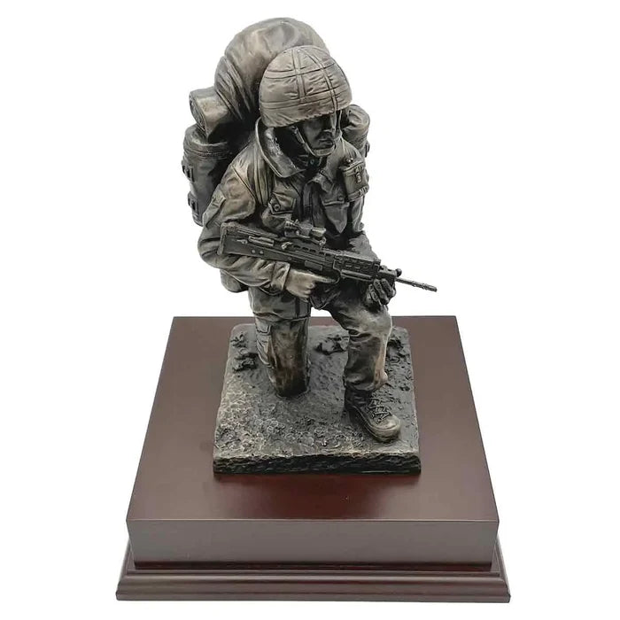 Kneeling Combat Figure with Beret | John Bull Clothing statue of a soldier in full gear kneeling with rifle on wooden base, ideal for military decor.  from  John Bull Clothing