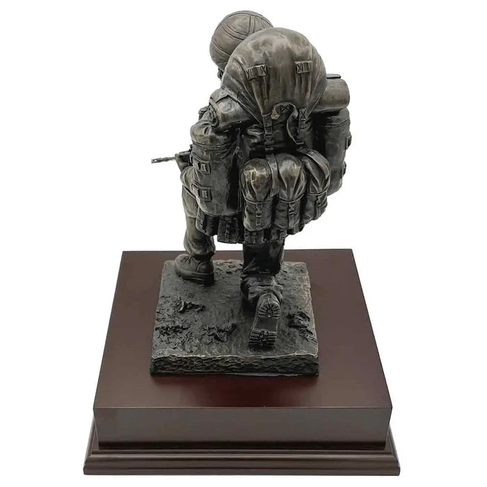Rear view of Kneeling Combat Figure with Beret statue highlighting detailed gear and tactical backpack, great for military-themed decor.  from  John Bull Clothing