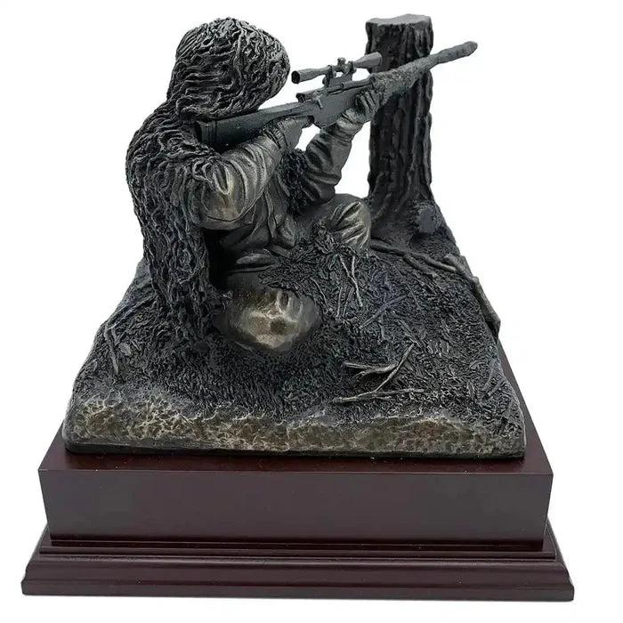 Bronze resin army statue of a kneeling sniper in ghillie suit aiming rifle, part of the Kneeling Sniper Figurine collection for military decor.  from  John Bull Clothing