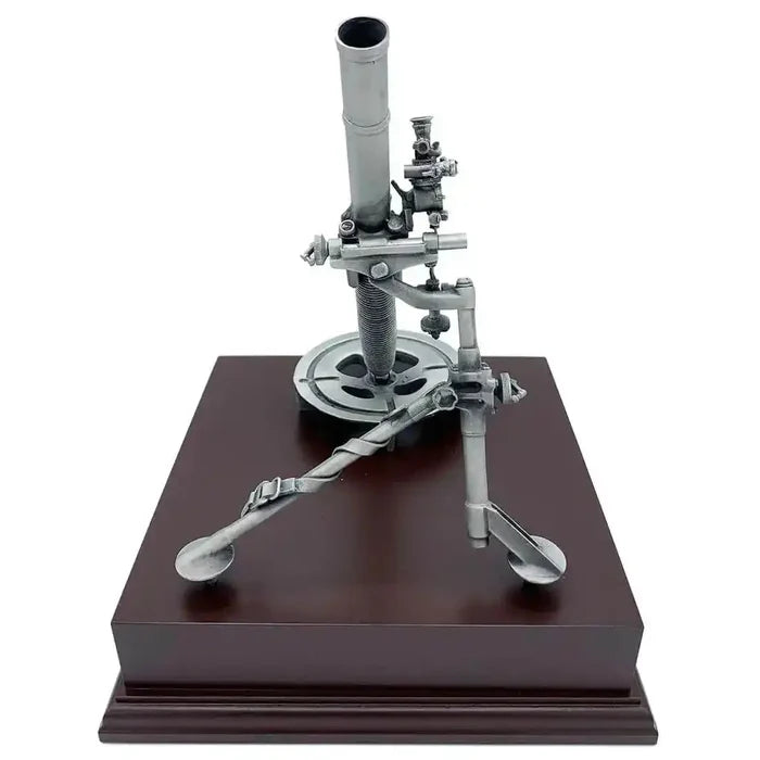 Rear view of L16 81mm Mortar Pewter Statue, emphasizing mechanical components and pewter finish on a polished wooden plinth.  from  John Bull Clothing