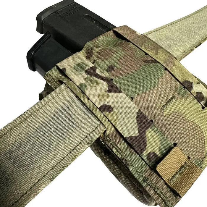 Back view of the Luminae Multicam Mega Pouch MTP attached to a tactical belt, highlighting its MOLLE-compatible design for versatile carrying options.  from  John Bull Clothing