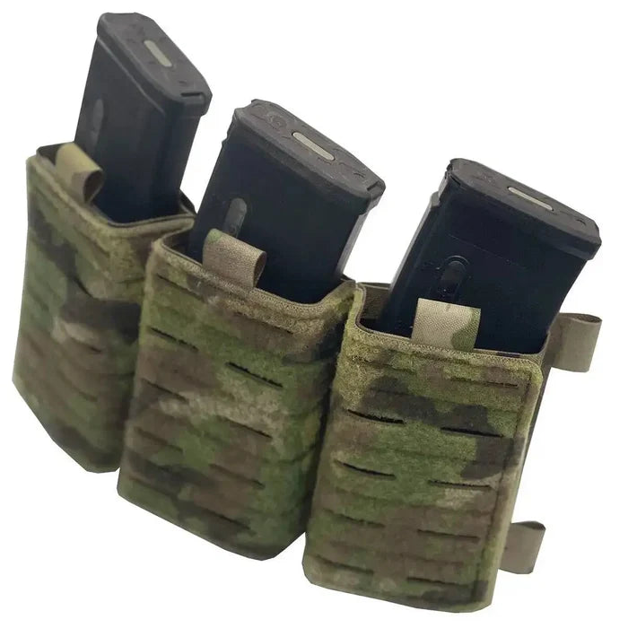 Luminae Multicam Triple Mag Pouch with Kydex Inserts securely holding three 5.56 magazines. Durable Cordura construction with laser-cut MOLLE design.  from  John Bull Clothing
