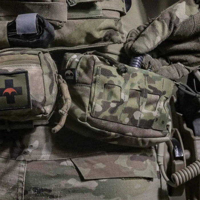 Luminae Multicam Small GP Pouch MTP attached to a tactical vest, demonstrating its practical design for military and outdoor applications.  from  John Bull Clothing