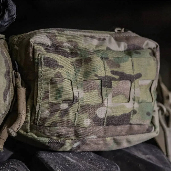 Close-up of the Luminae Multicam Small GP Pouch MTP mounted on gear, showing its rugged Cordura fabric and MOLLE attachment system.  from  John Bull Clothing
