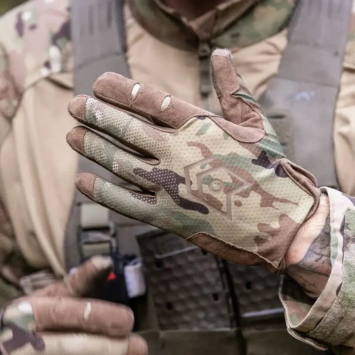 MoG Target Light Duty Gloves Multicam worn in field, showcasing flexible fit and camo pattern for professional tactical and safety operations.  from  John Bull Clothing