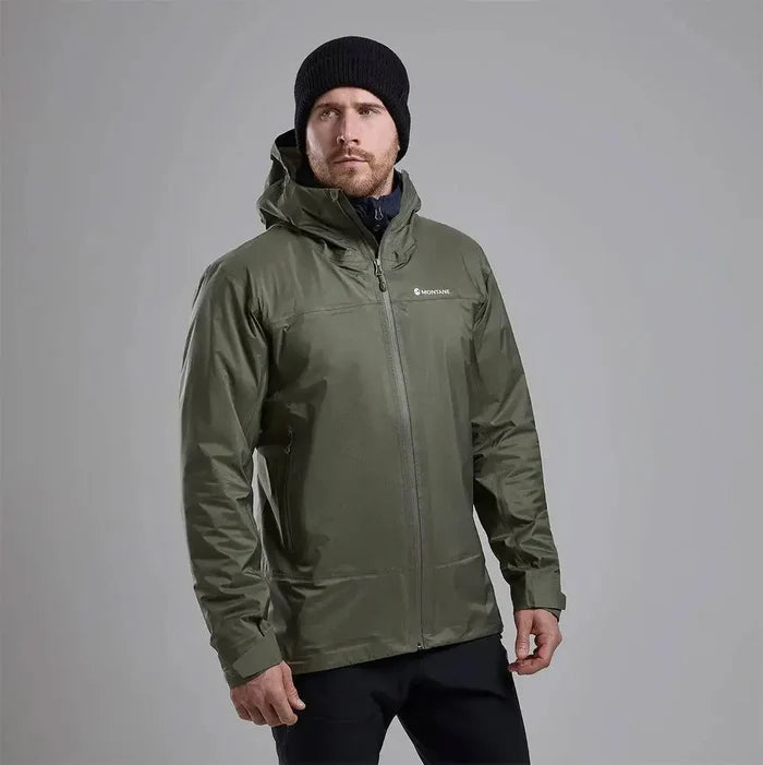 Model wearing Montane Mens Cetus Lite Waterproof Jacket in olive green, showcasing its comfortable fit and weather-resistant features.  from  John Bull Clothing