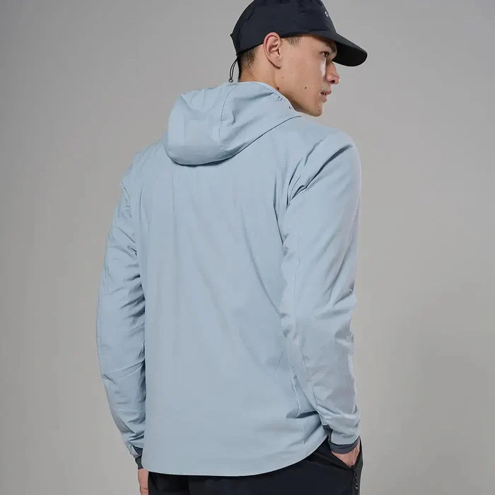 Male model wearing light gray softshell hooded jacket with black cap, side view, outdoor apparel for active wear, SKU: JB1617-MS-S