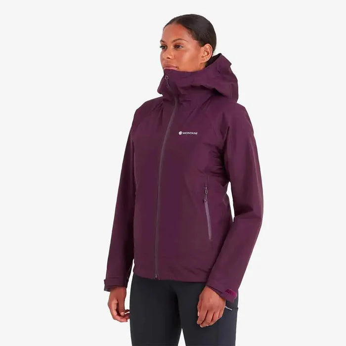 Side view of Montane Womens Spirit Waterproof Jacket in purple. Features a waterproof design with an adjustable hood.  from  John Bull Clothing