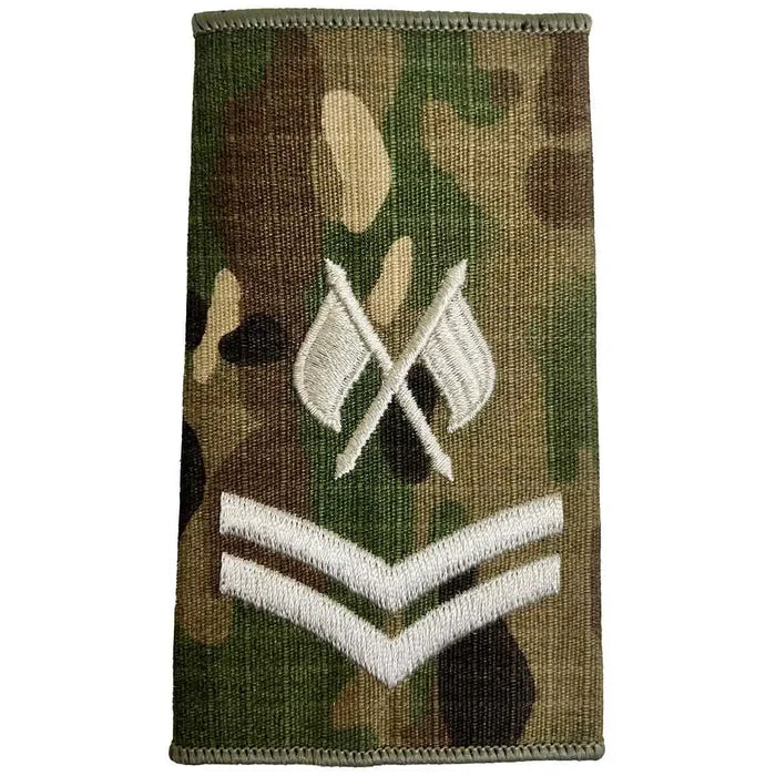 Multicam Rank Slide with crossed flags and two ivory chevrons, indicating signals corporal rank, MOD spec by John Bulls. Corporal + Crossed Flags from  John Bull Clothing