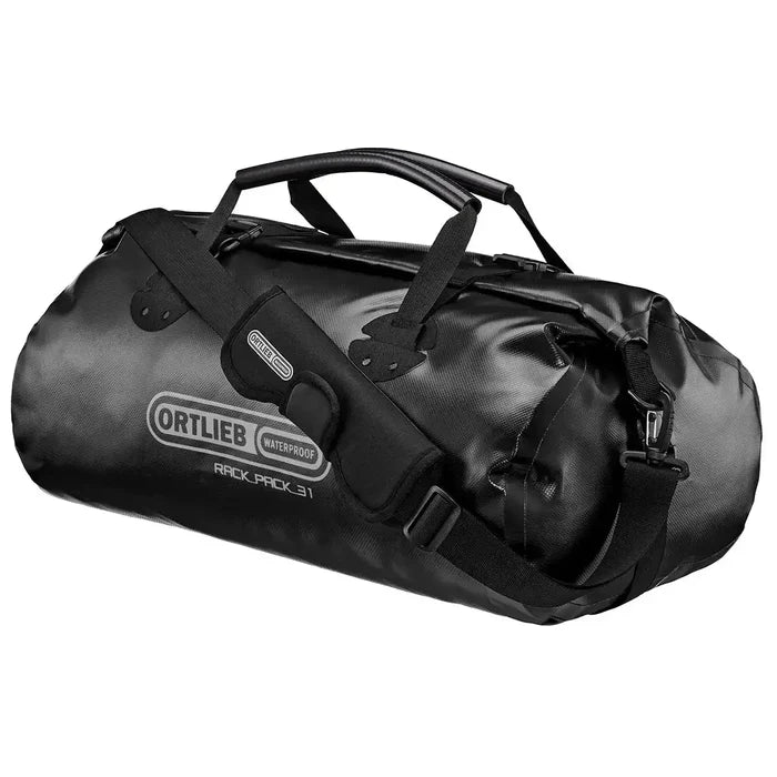 Black Ortlieb Rack Pack 31L Waterproof Duffle Bag with roll-top closure and ergonomic handles, perfect for rugged travel and gear protection. Black from  John Bull Clothing