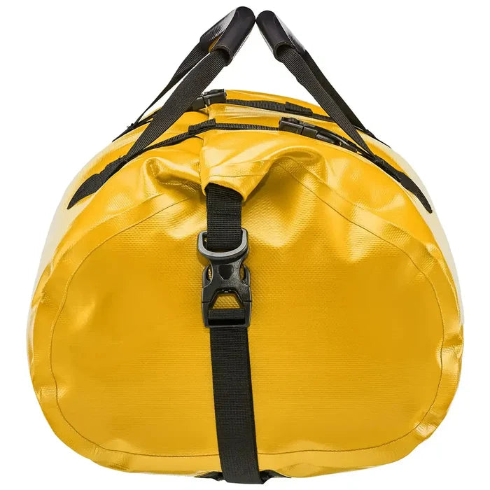 Side view of yellow Ortlieb Rack Pack 31L Waterproof Duffle Bag showing secure buckle closure and roll-top sealing system.  from  John Bull Clothing
