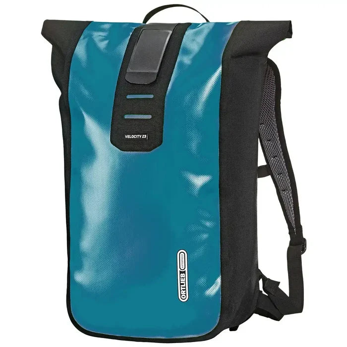 Ortlieb Velocity 23L Dry Backpack in teal with black trim, featuring a waterproof roll-top design for hiking and urban commuting use. Petrol from  John Bull Clothing
