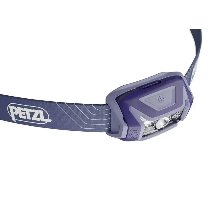 Side view of Petzl Tikka Head Torch with Red Light 350 Lumens in blue, highlighting the power button and ergonomic design.  from  John Bull Clothing