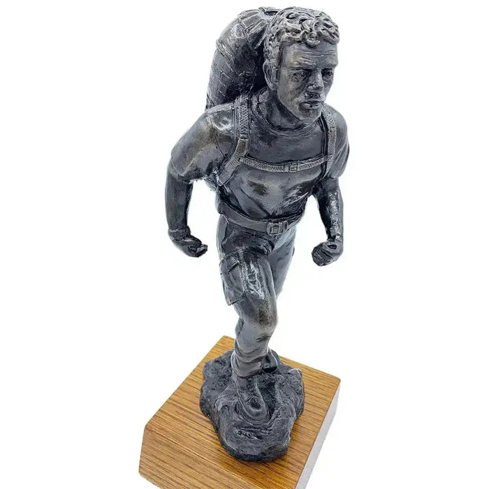 Top view of PTI Instructor with Bergen Bronze Resin Statue, capturing facial expression and dynamic pose for military-themed decor.  from  John Bull Clothing