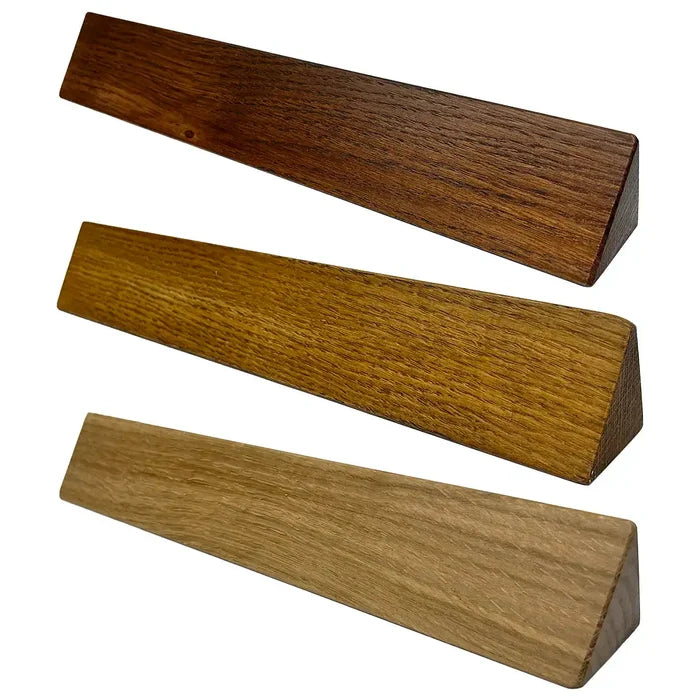Three Regimental Desk Name Plate wooden blocks in oak finish, showcasing Toblerone-style triangular shape for stable desk mounting.  from  John Bull Clothing