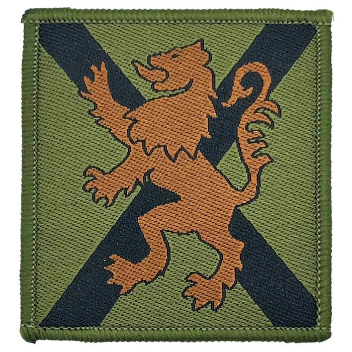Single Royal Regiment of Scotland TRF patch in green camo with black saltire and brown lion, hook & loop backing for military uniforms. Green/Black from  John Bull Clothing