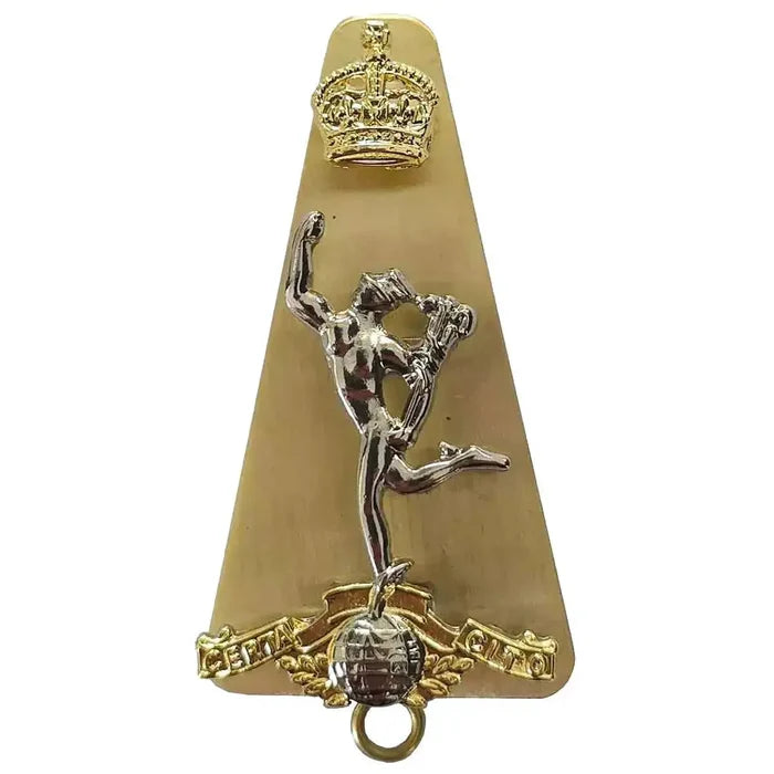 Royal Signals Cap Badge with Kings Tudor Crown featuring a brass base with a silver Mercury figure and a detailed Tudor Crown emblem.  from  John Bull Clothing
