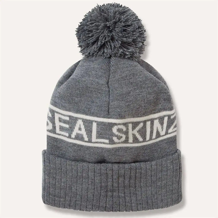 Back view of grey Sealskinz Heacham Waterproof Cold Weather Icon Bobble Hat showing full ribbed cuff and soft pom-pom.  from  John Bull Clothing