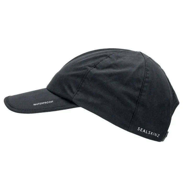 Black Sealskinz Waterproof All Weather Baseball Cap featuring a curved brim and waterproof material. Perfect for staying dry and comfortable outdoors. Black from  John Bull Clothing