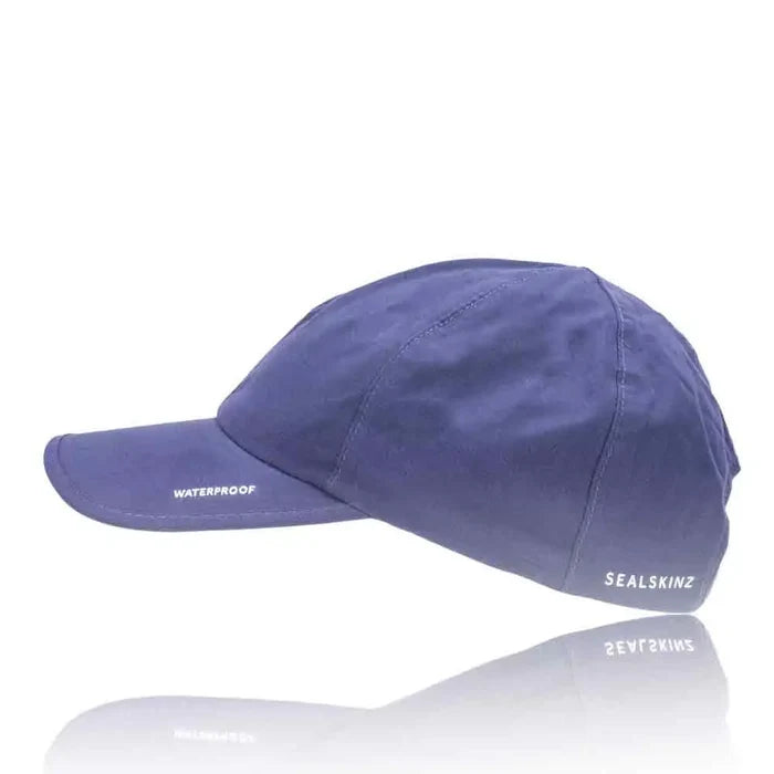 Sealskinz Waterproof All Weather Baseball Cap in navy with a sleek, minimalist design. Provides excellent protection against rain and wind.  from  John Bull Clothing