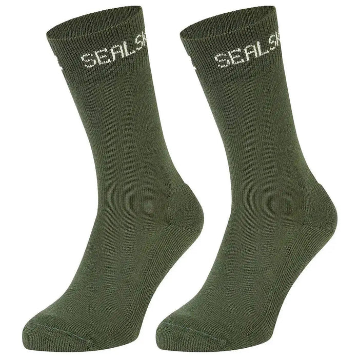 SealSkinz Suffield Solo Merino Liner Sock in olive green, crafted for versatility and warmth. Perfect for outdoor activities in various conditions. Olive Green from  John Bull Clothing