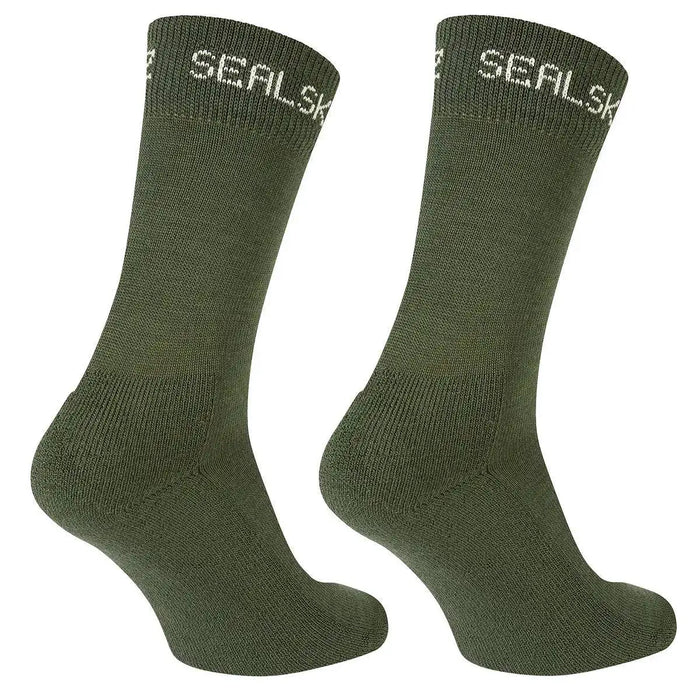 Side view of SealSkinz Suffield Solo Merino Liner Sock in olive green, showcasing its snug fit. Designed for comfort and moisture-wicking performance.  from  John Bull Clothing