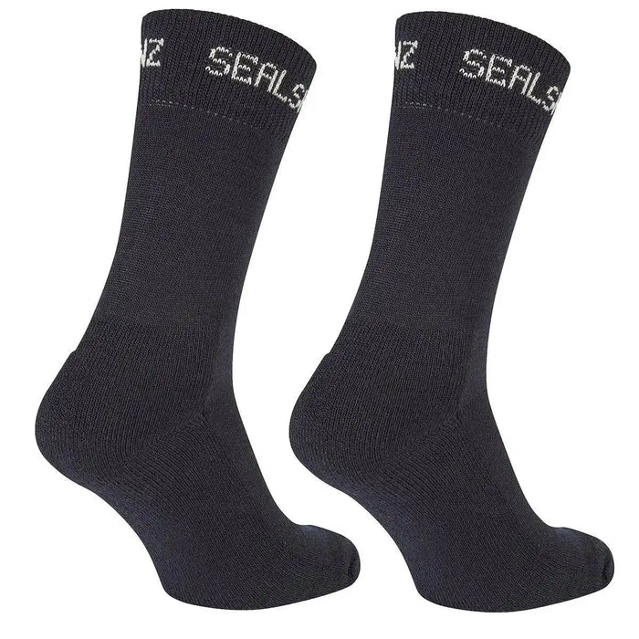 Side view of SealSkinz Suffield Solo Merino Liner Sock in black, highlighting its ergonomic design. Provides warmth and breathability for all-day wear.  from  John Bull Clothing