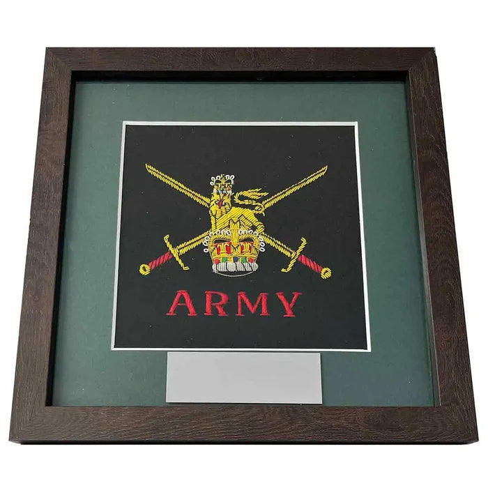 Single framed Army presentation with embroidered badge and nameplate, set in a dark green card mount and modern wooden frame. Ideal for military memorabilia display. Army from  John Bull Clothing