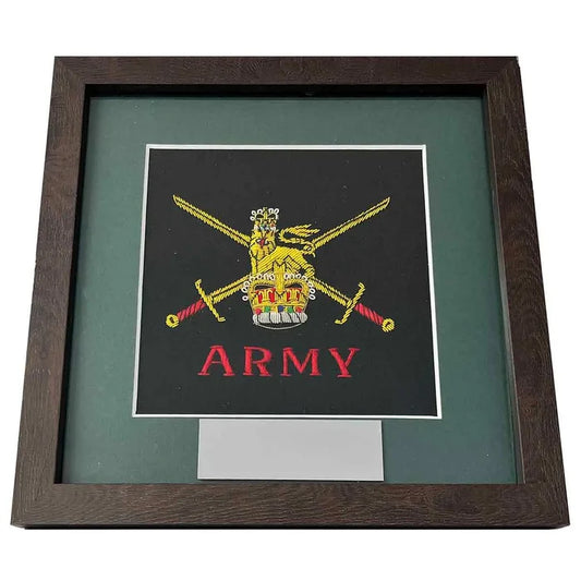 Single framed Army presentation with embroidered badge and nameplate, set in a dark green card mount and modern wooden frame. Ideal for military memorabilia display. Army from  John Bull Clothing