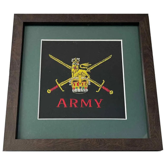 Bespoke Army presentation frame featuring an embroidered regiment badge in a dark green mount with a wooden frame. A perfect gift for military personnel.  from  John Bull Clothing