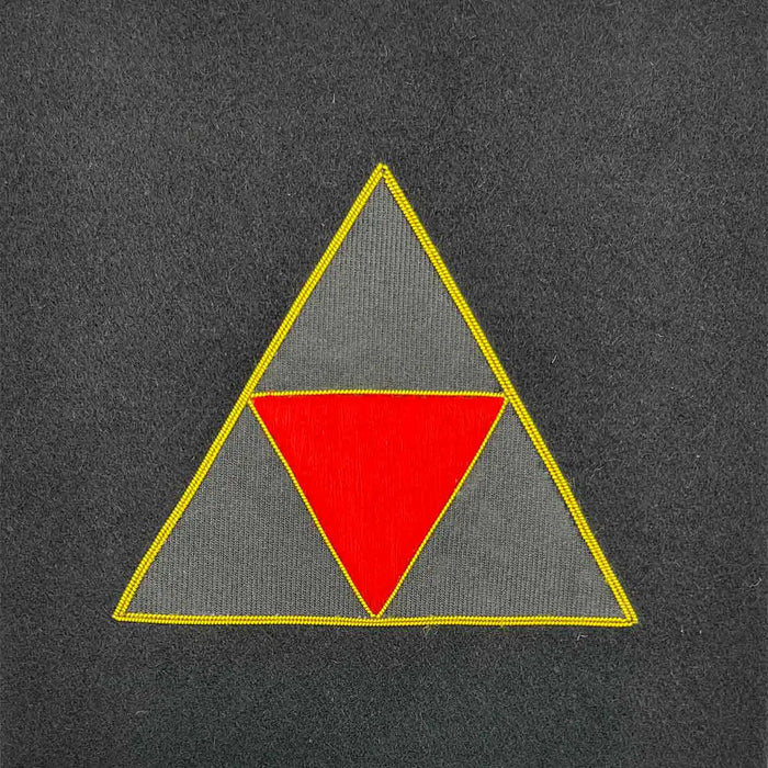 Triangular military insignia with a red and grey geometric design, bordered in gold. Suitable for framed Army presentations and military collections. 3 UK Division from  John Bull Clothing