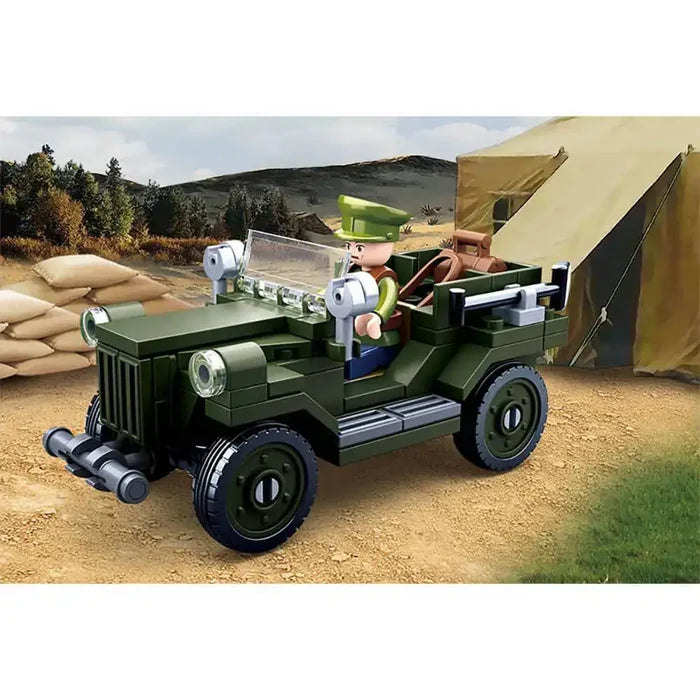 Sluban M38-B0682 Allied Light Truck toy jeep displayed in a desert army camp scene, perfect for imaginative WWII-themed play.  from  John Bull Clothing