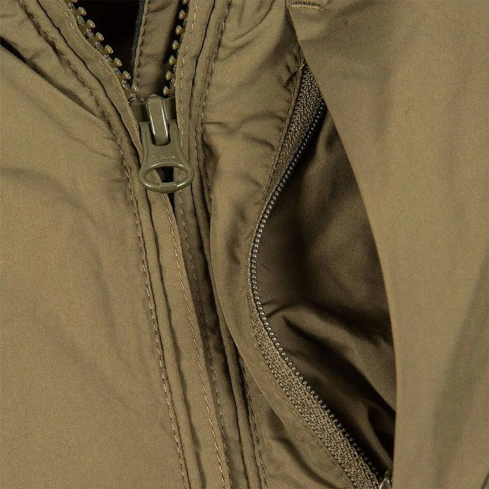 Close-up of Snugpak Arrowhead Insulated Jacket Olive WGTE zipper and inner lining, showcasing high-quality stitching and thermal insulation.  from  John Bull Clothing