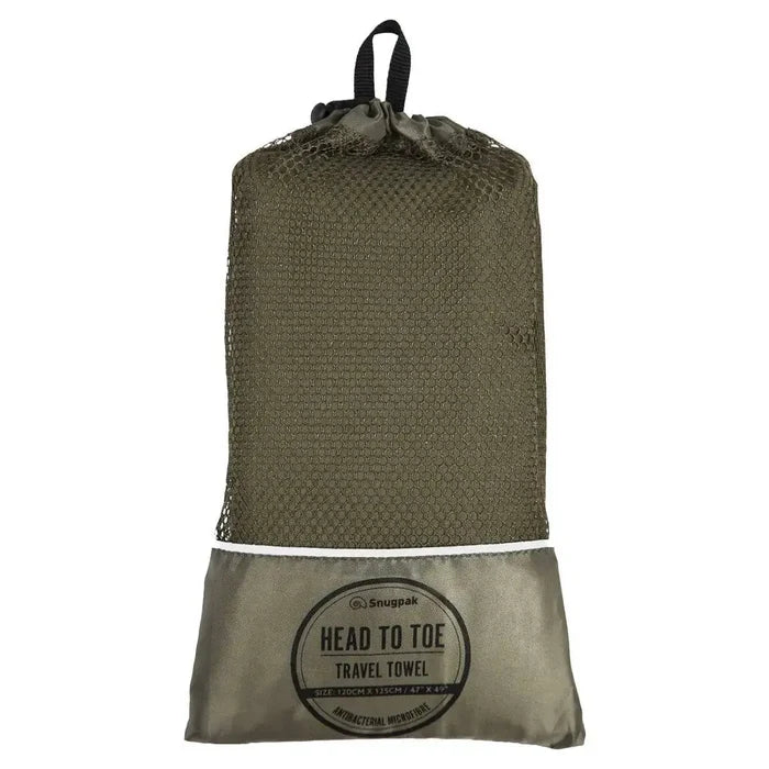 Snugpak Head to Toe Travel Towel in Olive packed in a breathable mesh storage bag. Compact and quick-drying for travel and outdoor use.  from  John Bull Clothing