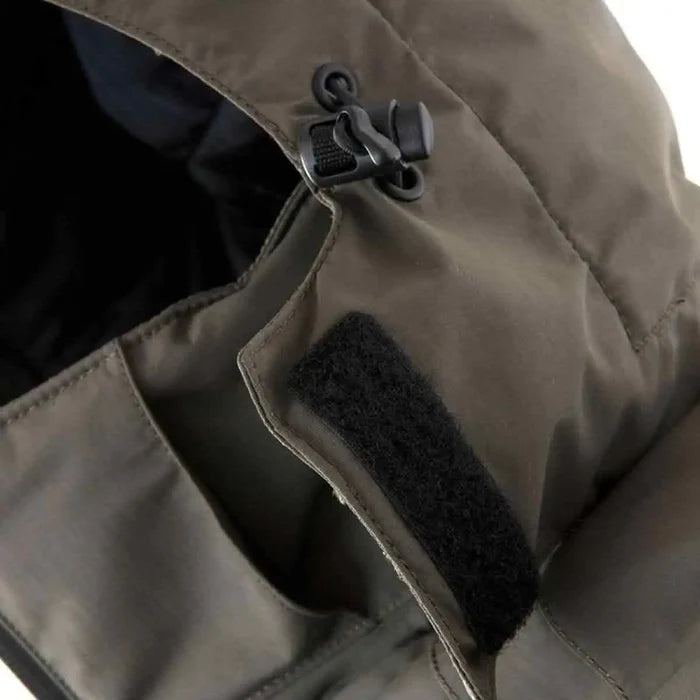 Close-up of Snugpak Torrent hood adjustment toggle and Velcro flap, showcasing waterproof design and secure fit.  from  John Bull Clothing