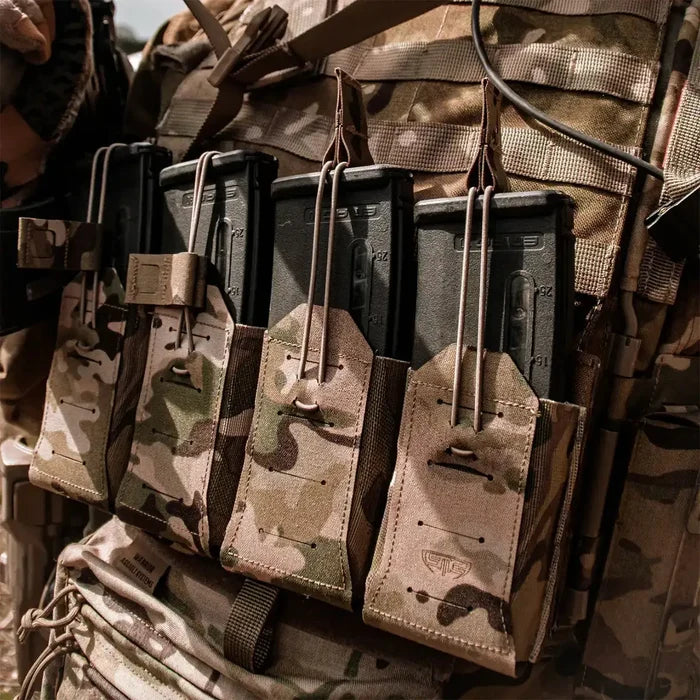 Spectre Quad Elastic Magazine Pouch MTP by John Bulls mounted on tactical vest, holding four rifle magazines in multicam pattern for military use.  from  John Bull Clothing