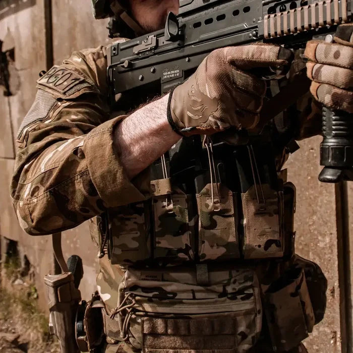 Operator wearing Spectre Quad Elastic Magazine Pouch MTP during tactical training, demonstrating quick-access magazine storage in multicam gear setup.  from  John Bull Clothing