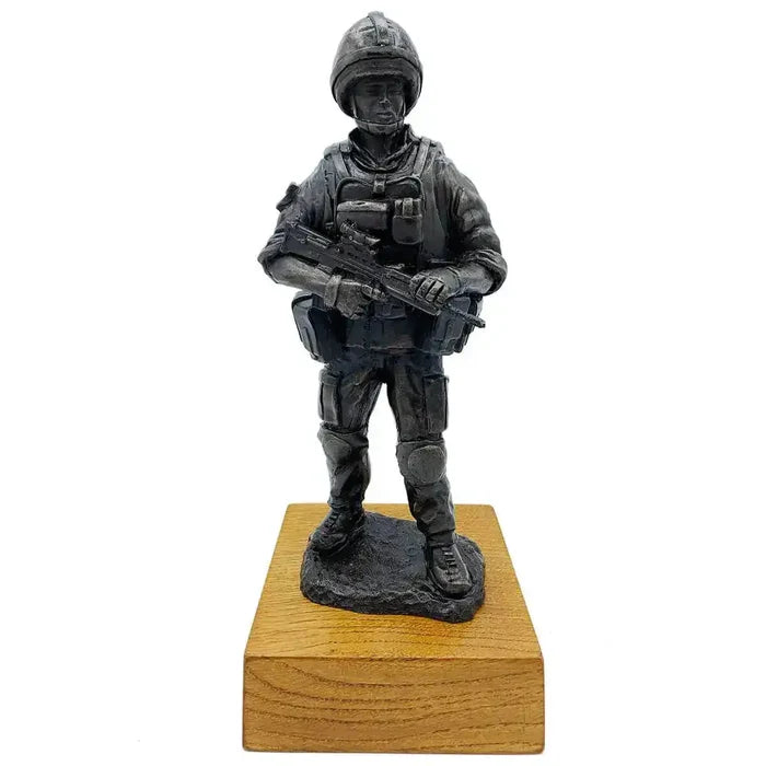 British Standing Combat Patrol Bronze Statue by John Bulls featuring a soldier in full gear with SA80 rifle on solid oak base, front view.  from  John Bull Clothing