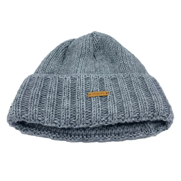 Folded grey Starling Unisex Rollover Beanie Hat 12033 with ribbed knit design and leather logo patch, crafted from premium wool blend. Grey from  John Bull Clothing