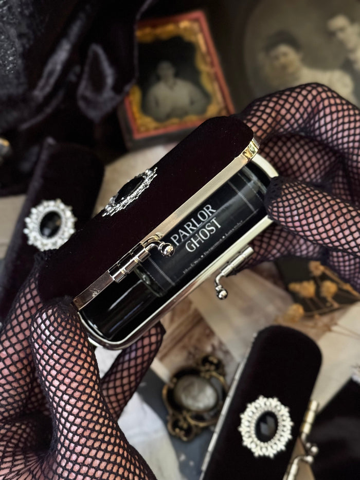 The Mourning Compact - perfume carry case.