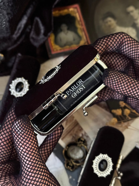 The Mourning Compact - perfume carry case.
