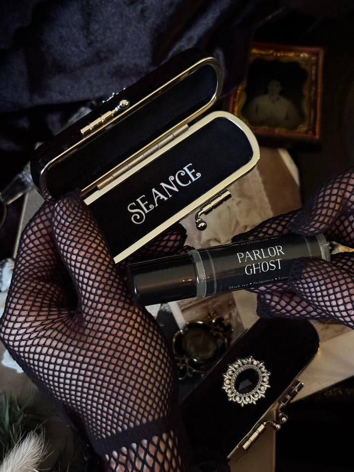 The Mourning Compact - perfume carry case.
