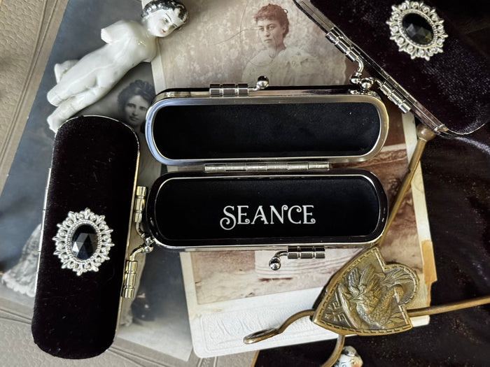 The Mourning Compact - perfume carry case.
