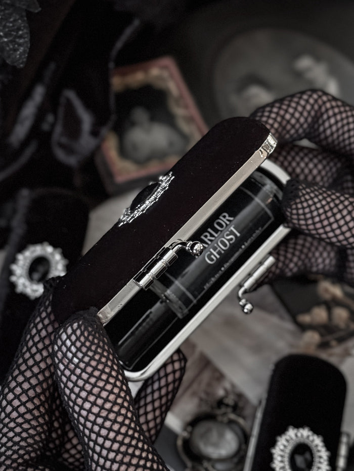 The Mourning Compact - perfume carry case.