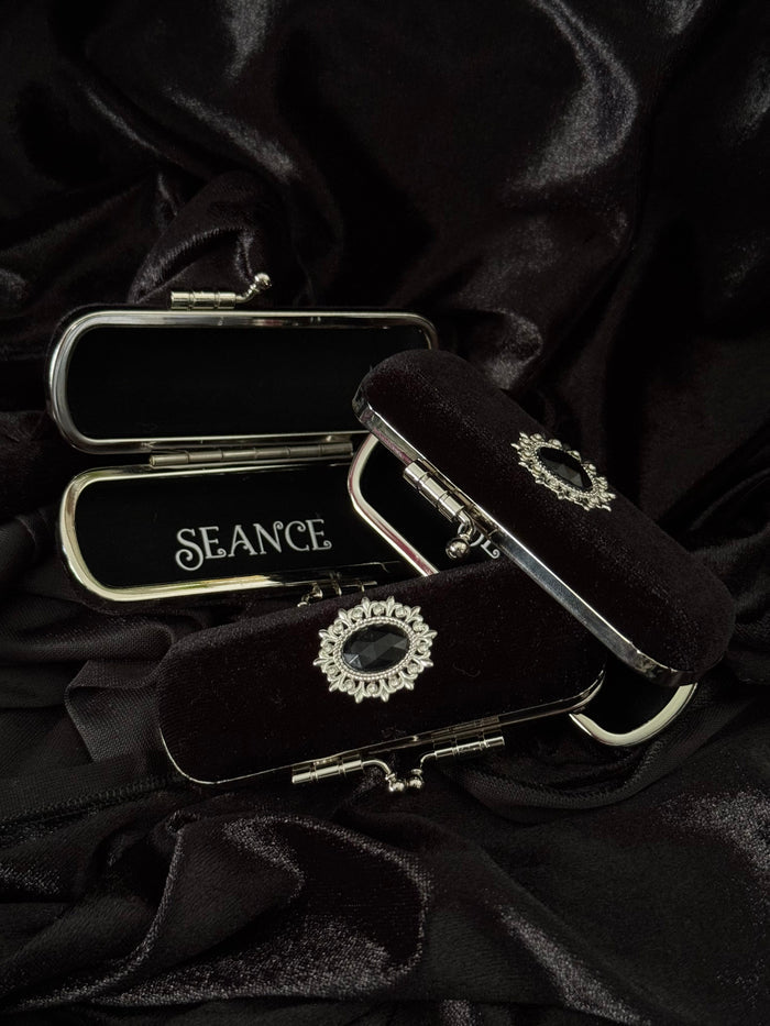 The Mourning Compact - perfume carry case.