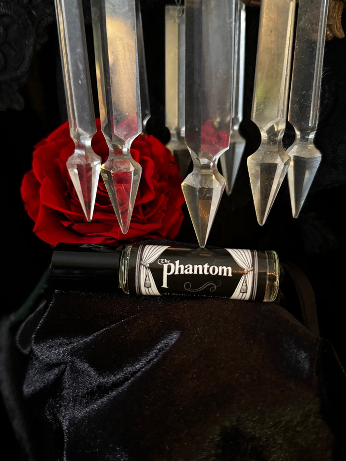 The Phantom- (rose, sandalwood, bourbon, velvet seats)