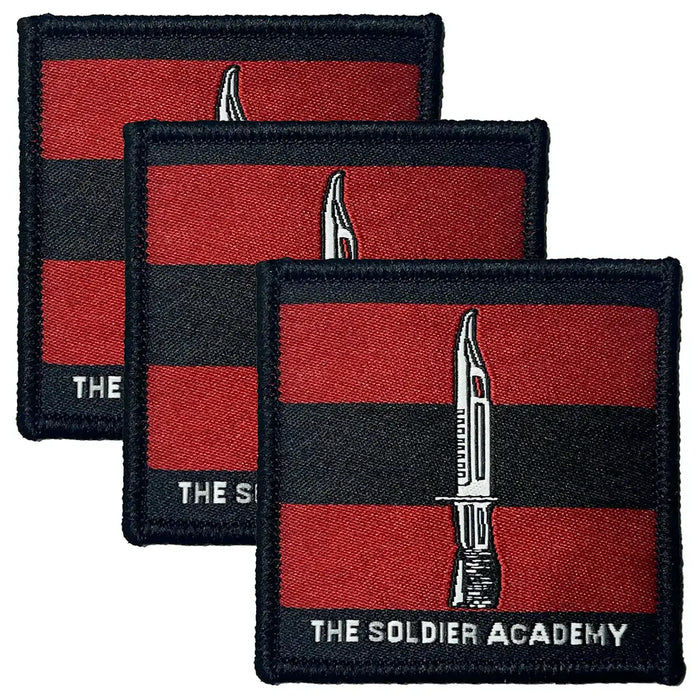 The Soldier Academy TRF sew or iron on patch by John Bulls featuring a red and black background with a bayonet design, ideal for military uniforms. 3 Pack from  John Bull Clothing