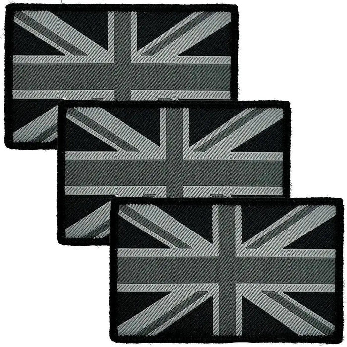 Three black Union Jack patches with hook and loop backing, perfect for jackets, hats, and tactical equipment from John Bulls. Mono Black from  John Bull Clothing