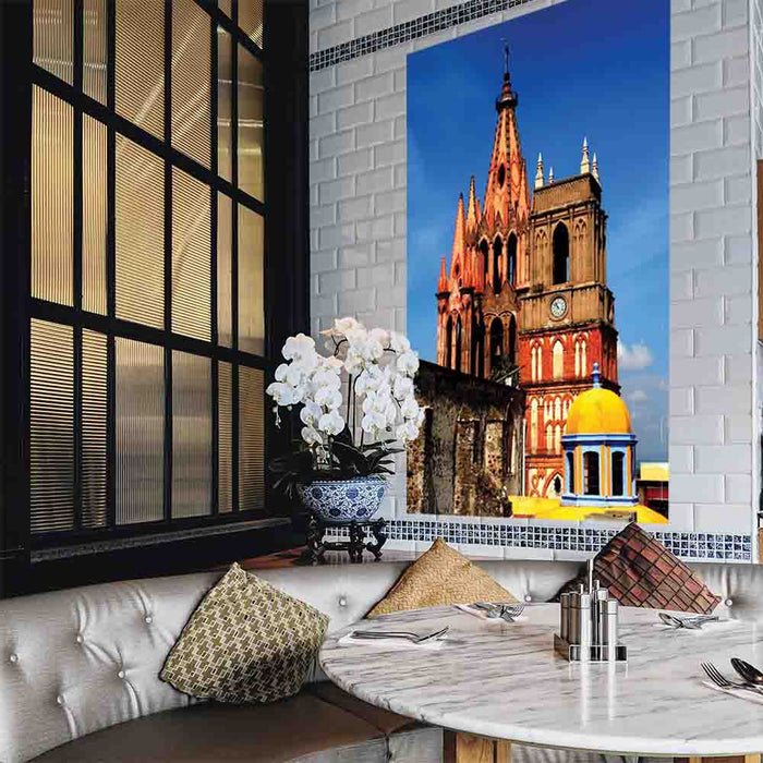 60 inch decal of a colorful Mexican cathedral installed on a wall in a restaurant